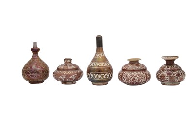 Lot 29 - A COLLECTION OF FIVE SAFAVID COPPER LUSTRE-PAINTED POTTERY BOTTLES AND VASES