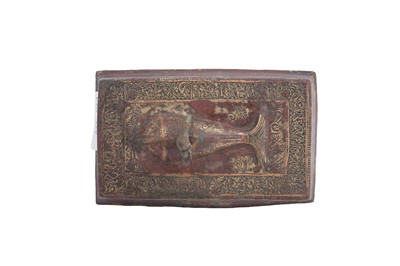 Lot 11 - A SELJUK ENGRAVED AND COPPER-INLAID BRONZE COVER WITH FISH DESIGN