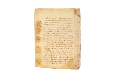 Lot 4 - A LOOSE FOLIO FROM A MINIATURE QUR’AN IN PROTO-MAGHRIBI SCRIPT