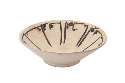 Lot 7 - A SAMANID EPIGRAPHIC POTTERY BOWL