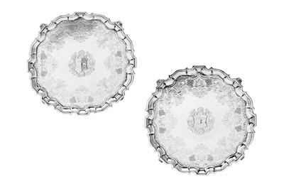 Lot 508 - A good pair of George II sterling silver salvers, London 1733 by Dennis Langton