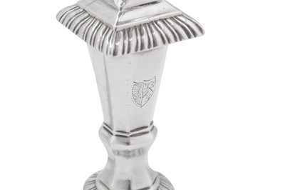 Lot 496 - A large pair of early George III sterling silver candlesticks, London 1764 by John Hyatt (Grimwade 1369)