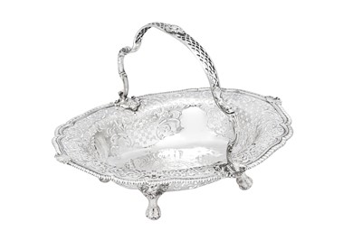 Lot 504 - A George II sterling silver cake basket, London 1750 by Samuel Herbert and Henry Bailey