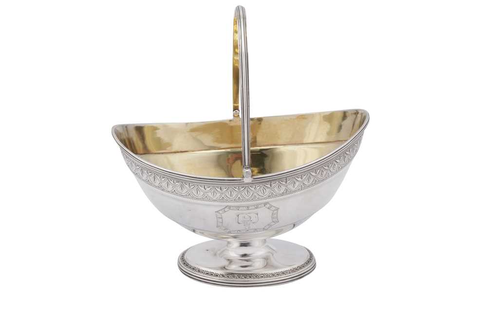 Lot 429 - An interesting George III sterling silver sugar basket, London 1791 by John Edwards III and William Frisbee (reg. 12th April 1791)