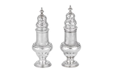 Lot 444 - A pair of George III sterling silver pepper casters, London 1772 by Thomas & Jabez Daniell