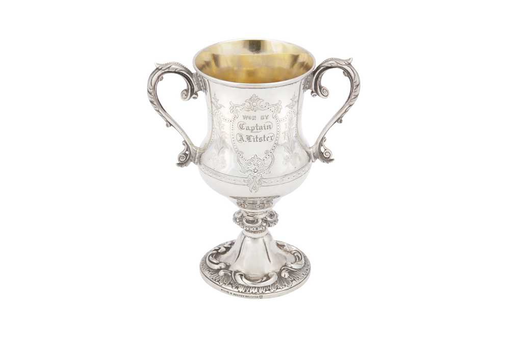 Lot 57 - A third quarter 19th century Indian Colonial silver twin handled cup, Calcutta dated 1876 by Cooke and Kelvey