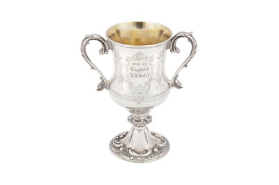 Lot 57 - A third quarter 19th century Indian Colonial silver twin handled cup, Calcutta dated 1876 by Cooke and Kelvey