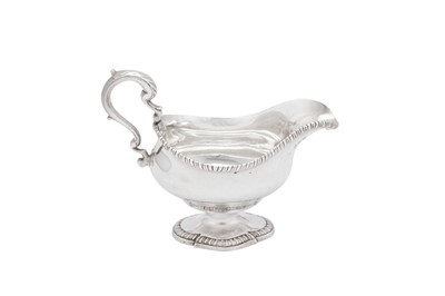 Lot 486 - A George III sterling silver sauceboat, London 1771 by RT (untraced)