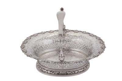 Lot 515 - A George II sterling silver cake basket, London 1740 by John Jacob (reg. 20th June 1739)