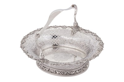 Lot 515 - A George II sterling silver cake basket, London 1740 by John Jacob (reg. 20th June 1739)