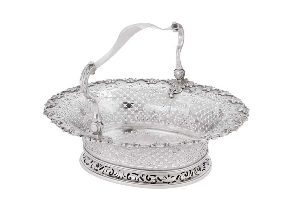 Lot 515 - A George II sterling silver cake basket, London 1740 by John Jacob (reg. 20th June 1739)