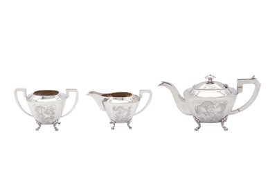 Lot 109 - An early 20th century Chinese Export silver three-piece tea service, Hong Kong circa 1930 retailed by Tack Hing and Co