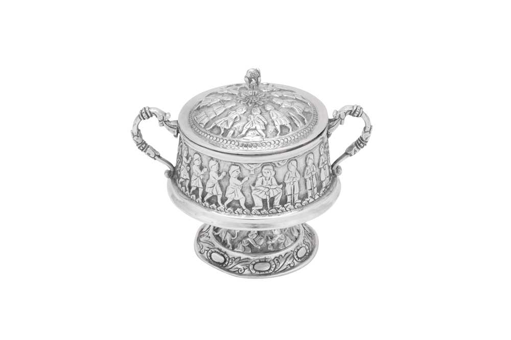 Lot 158 - An early 20th century Iranian (Persian) unmarked silver covered twin handled sugar bowl, Kermanshah circa 1920