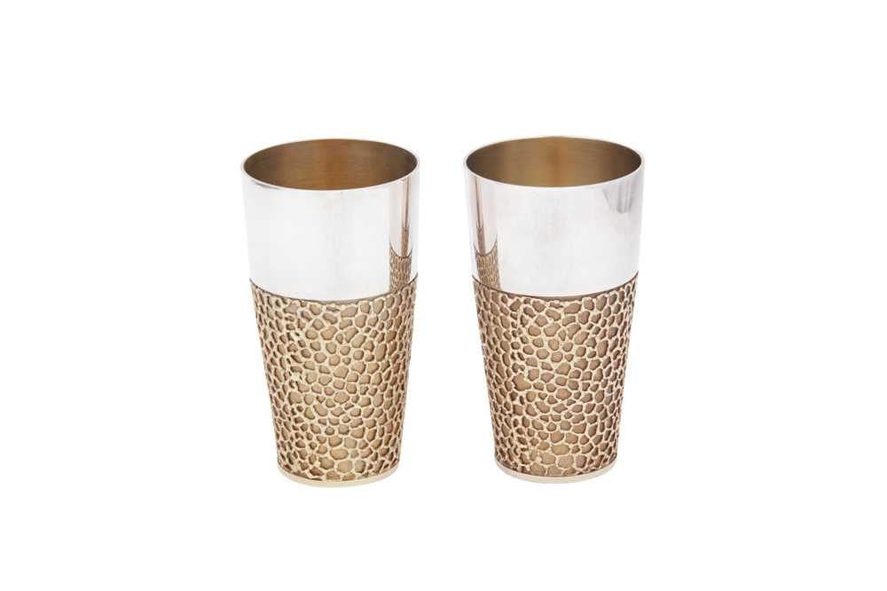 Lot 347 - A pair of Elizabeth II modernist parcel gilt sterling silver beakers, London 1970 by Stuart Devlin (1931-2018)