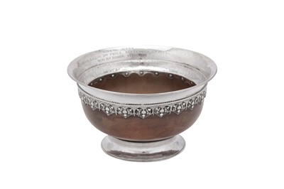 Lot 333 - A George V 'Arts and Crafts' sterling silver mazer bowl, London 1931 by Omar Ramsden (1873-1939)