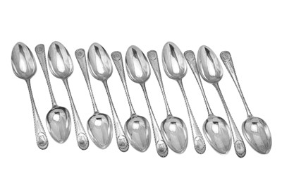 Lot 309 - A set of twelve George III Irish sterling silver dessert spoons, Dublin circa 1780 by John Bollard