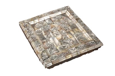 Lot 304 - λ AN ENGRAVED AND TINTED MOTHER-OF-PEARL MOSAIC PANEL WITH CHRISTIAN ICONS
