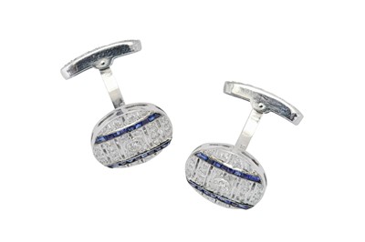 Lot 82 - A pair of diamond and sapphire cufflinks