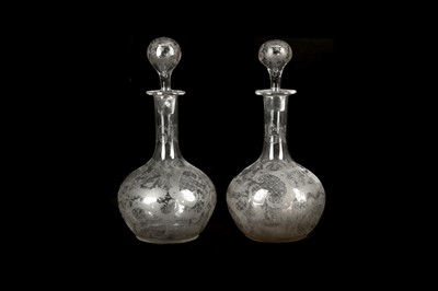 Lot 352 - A PAIR OF VICTORIAN ONION SHAPED DECANTERS