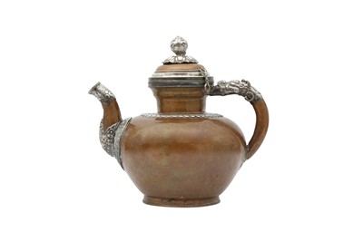 Lot 389 - A TIBETAN COPPER BUTTER-TEA TEAPOT AND COVER.