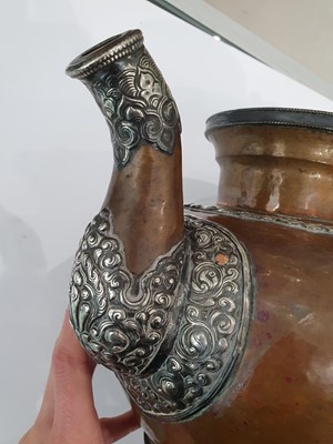 Lot 389 - A TIBETAN COPPER BUTTER-TEA TEAPOT AND COVER.