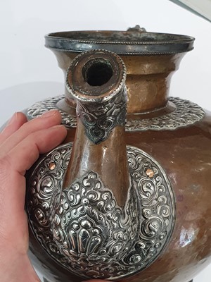 Lot 389 - A TIBETAN COPPER BUTTER-TEA TEAPOT AND COVER.