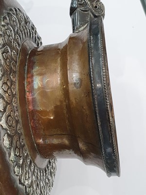 Lot 389 - A TIBETAN COPPER BUTTER-TEA TEAPOT AND COVER.