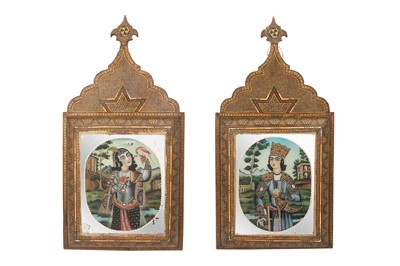 Lot 357 - A PAIR OF REVERSE GLASS PORTRAITS OF A QAJAR COURTLY COUPLE