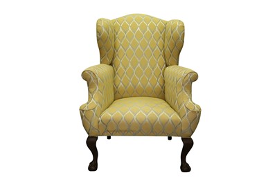Lot 99 - A GEORGE II STYLE WING BACK ARMCHAIR