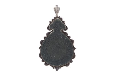 Lot 542 - A LARGE JADE INTAGLIO WITH AN OPENWORK SILVER PENDANT