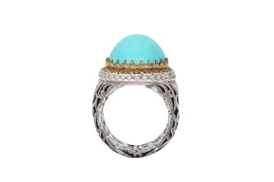 Lot 546 - A LARGE CABOUCHON TURQUOISE RING