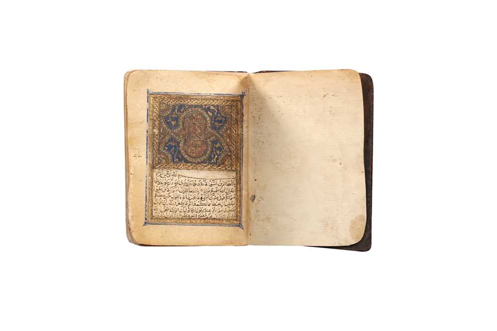 Lot 458 - A SECTION OF A MINIATURE QUR’AN: FROM SURA AL-HUJURAT (49) TO SURA AL-MUZZAMMIL (73)