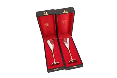 Lot 346 - A cased pair of Elizabeth II modernist sterling silver parcel gilt goblets or champagne flutes, London 1979 by Stuart Devlin (1931-2018)