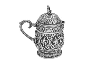 Lot 76 - A late 19th century Anglo – Indian unmarked silver covered milk jug, Madras circa 1890