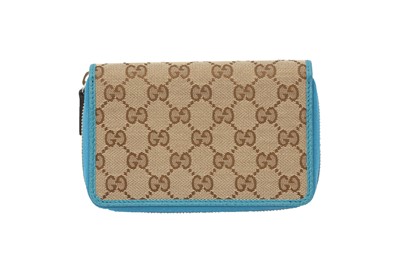 Lot 142 - Gucci Beige GG Monogram Zip Around Wallet