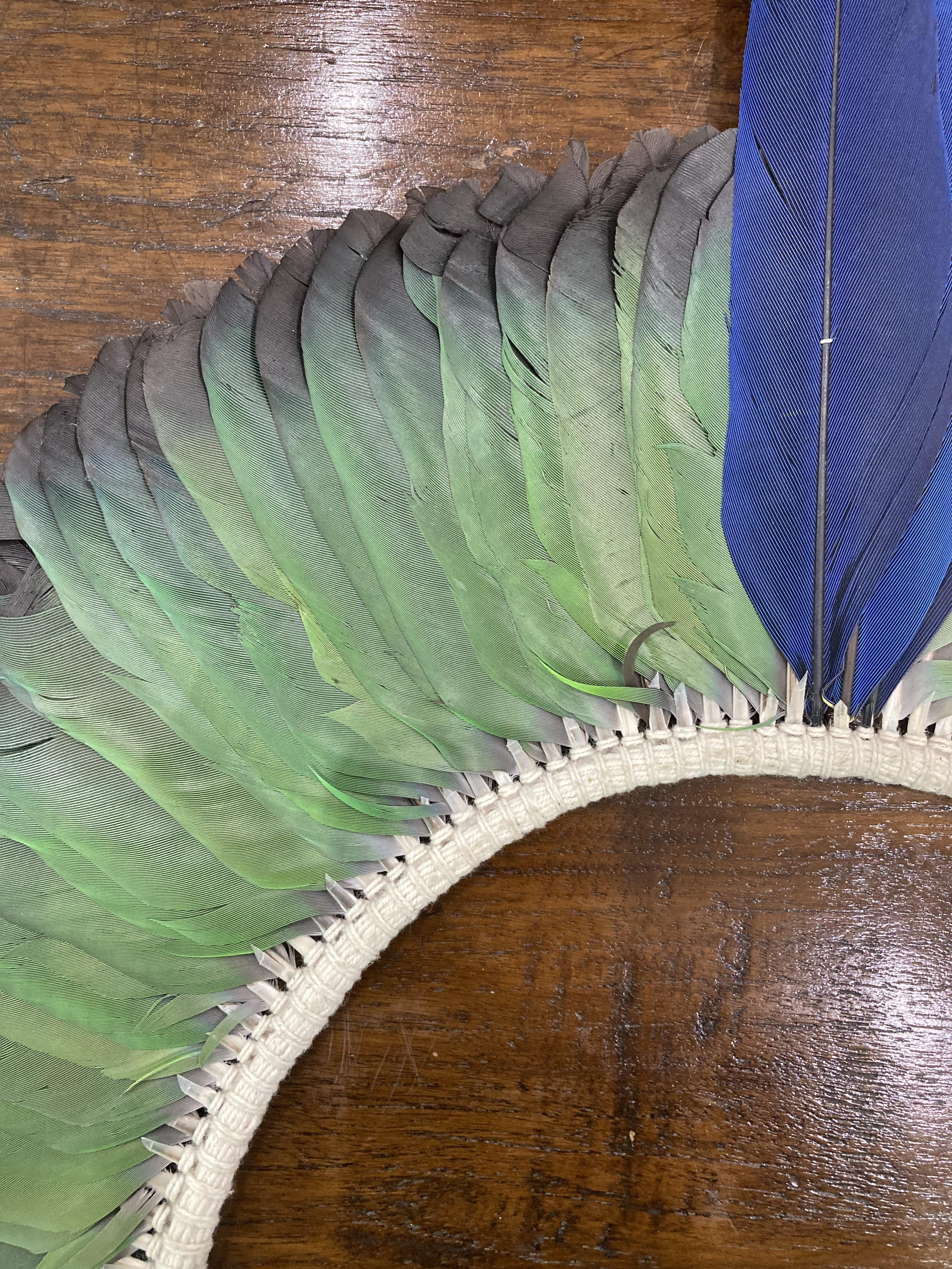 Lot 553 - A 20TH CENTURY BRAZILIAN TRIBAL FEATHER