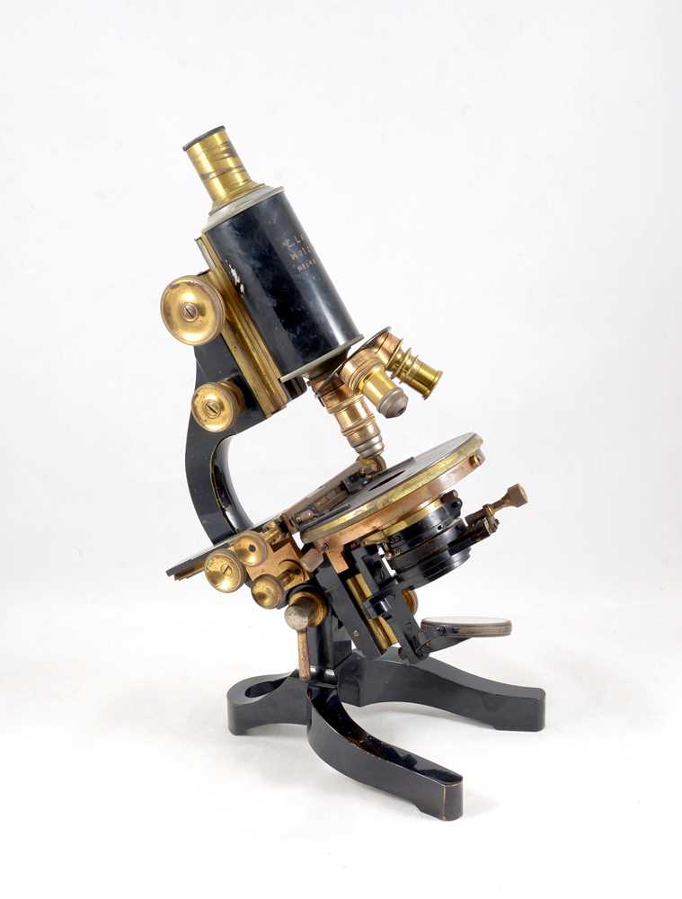 Lot 156 - A Brass Leitz Microscope with Accessories in Fitted Box