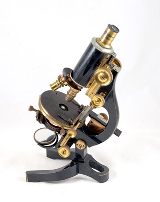 Lot 156 - A Brass Leitz Microscope with Accessories in Fitted Box