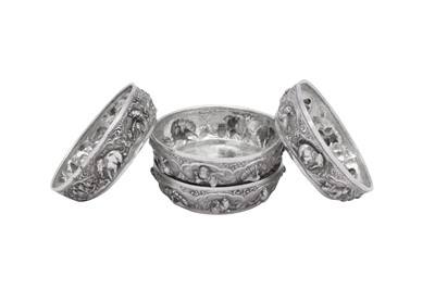 Lot 88 - A set of four early 20th century Burmese unmarked silver dishes or bowls, Rangoon circa 1910