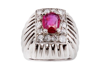 Lot 214 - A ruby and diamond dress ring