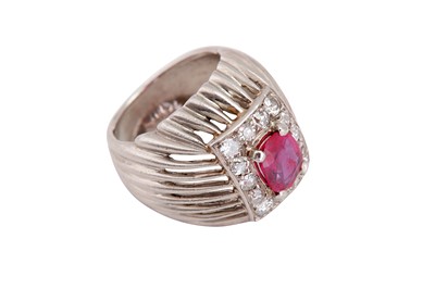 Lot 214 - A ruby and diamond dress ring