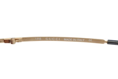 Lot 149 - Gucci Blue Rimless GG Logo Sunglasses