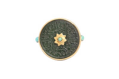 Lot 536 - A JADE INTAGLIO SEAL SET INTO A MODERN GOLD RING SHANK