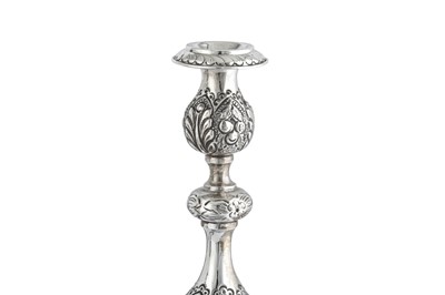 Lot 338 - Judaica - A pair of George V sterling silver sabbath candlesticks, London 1911 by Jacob Rosenzweig & Aaron Taitelbaum