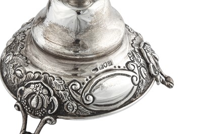Lot 338 - Judaica - A pair of George V sterling silver sabbath candlesticks, London 1911 by Jacob Rosenzweig & Aaron Taitelbaum