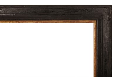 Lot 37 - AN ITALIAN EARLY 17TH CENTURY POPLAR WOOD PAINTED AND GILDED PLATE FRAME
