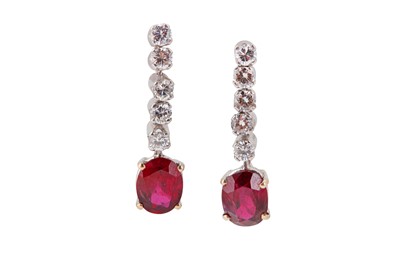 Lot 101 - A pair of ruby and diamond pendent earrings