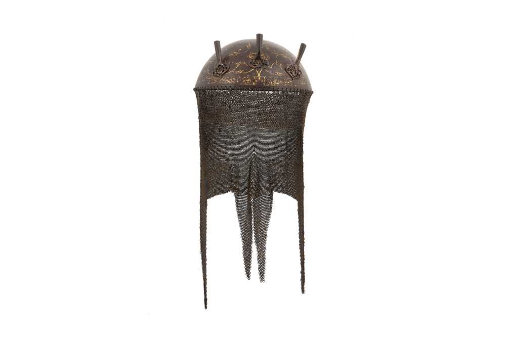 Lot 409 - A GOLD-DAMASCENED STEEL HELMET (KHULA KHUD)