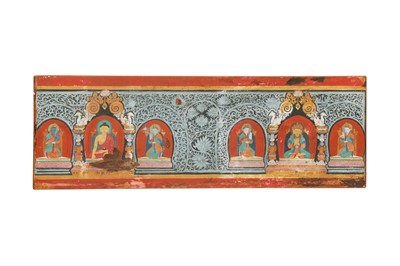 Lot 391 - A TIBETAN POLYCHROMED WOOD MANUSCRIPT COVER.