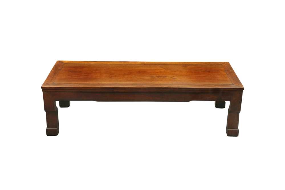 A CHINESE LOW HARDWOOD TABLE.